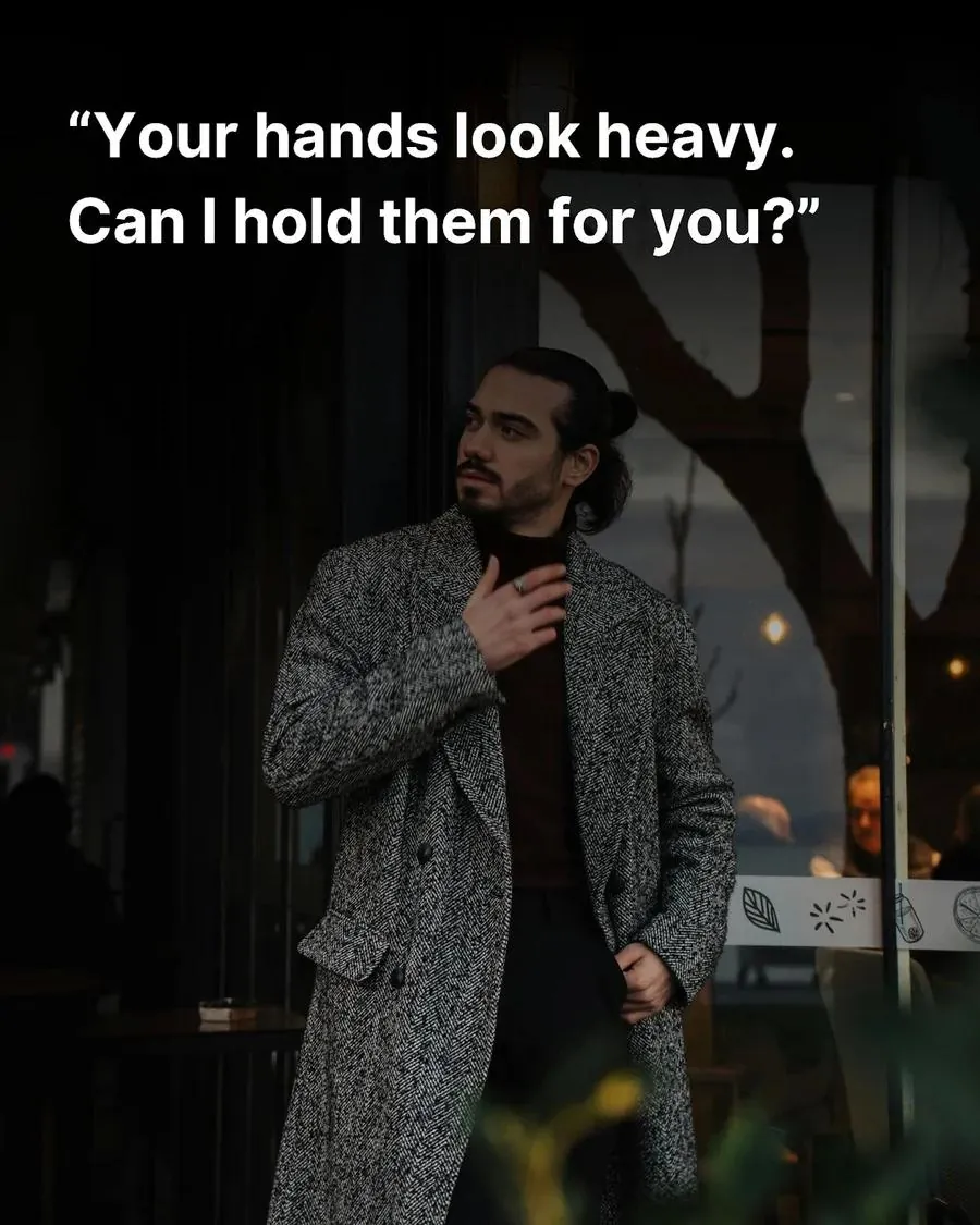 Attractive, sharp-dressed man standing in front of a coffee house