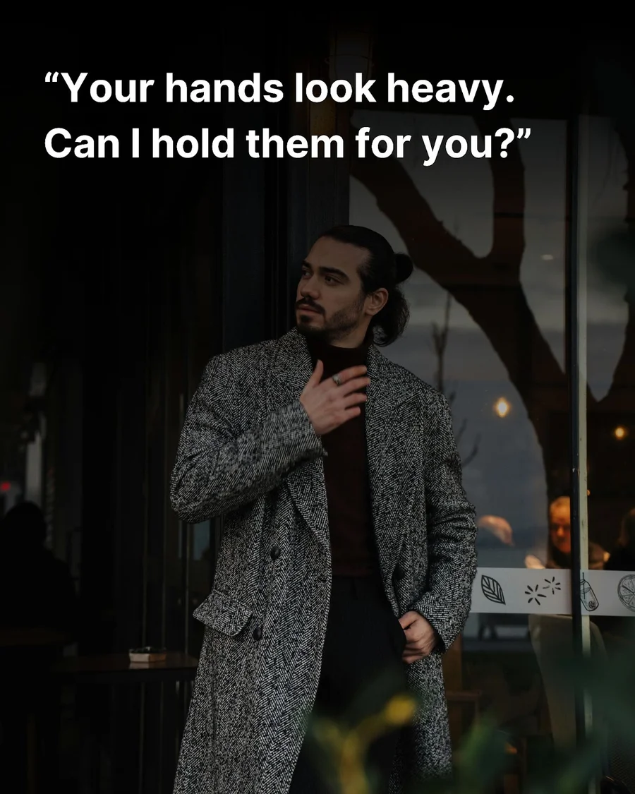 Attractive, sharp-dressed man standing in front of a coffee house